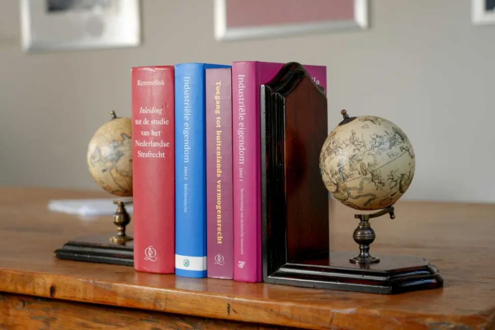 Globe bookends (replica) with historical cartography