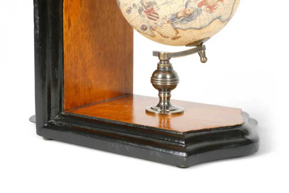 Globe bookends (replica) with historical cartography
