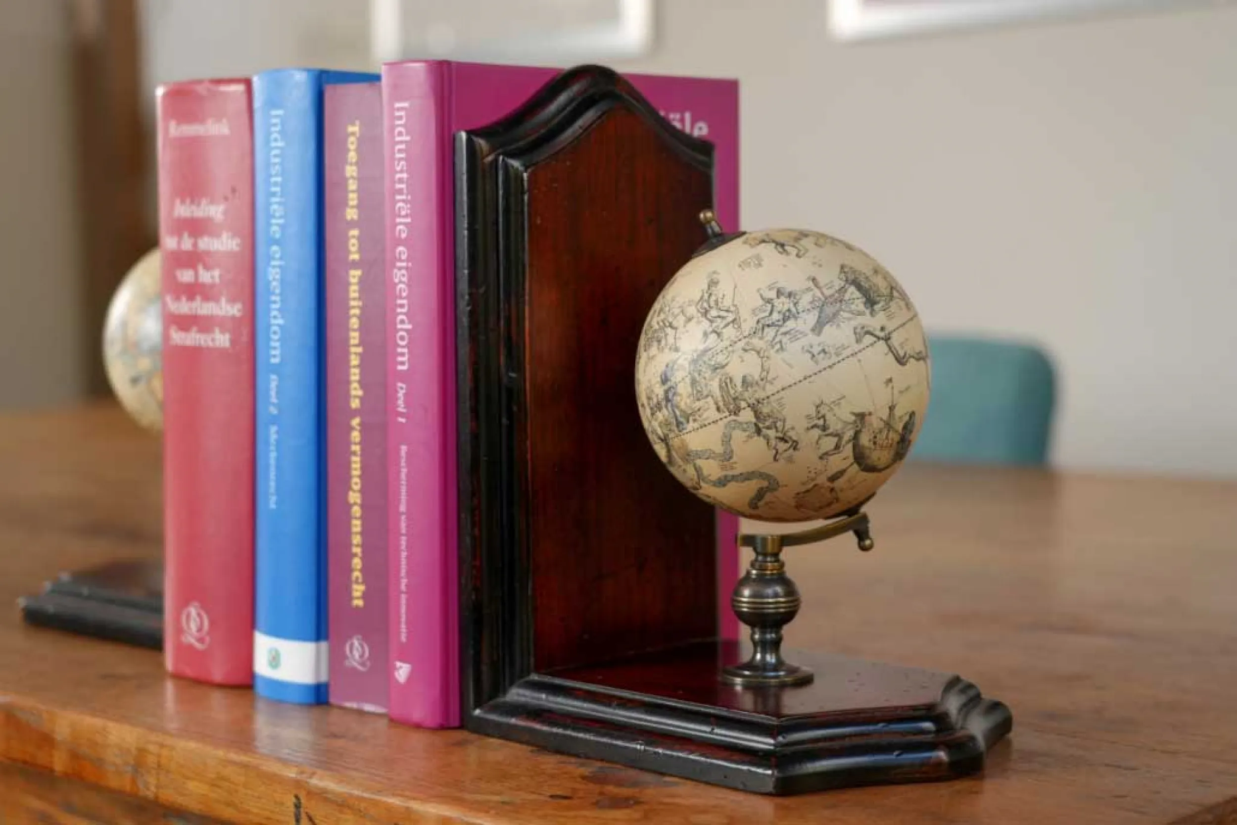 Globe bookends (replica) with historical cartography